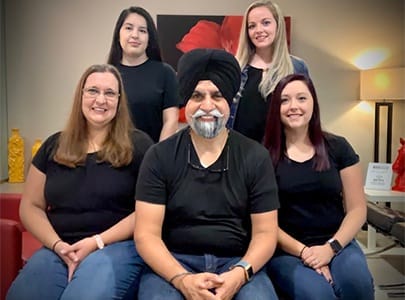 Dr. Singh and the Cary Dental Rejuvenation team