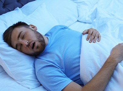 a man with sleep apnea sleeping
