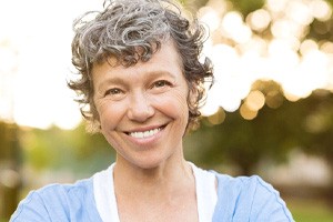 closeup of woman smiling outside