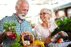 older couple shopping for healthy food