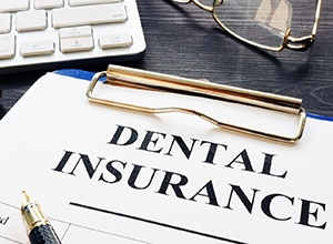 Insurance paperwork for the cost of Invisalign in Cary