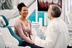dentist explaining financing options in Cary