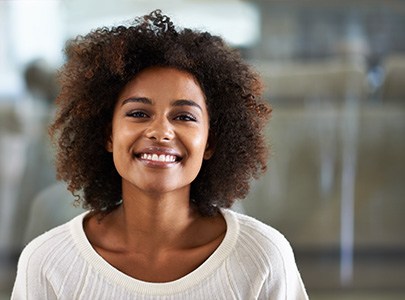 Cary patient smiling with SureSmile clear aligners