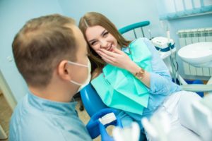 young woman at her dental checkup with her dentist in Cary 