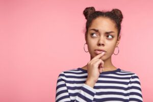 Woman wondering why she needs a root canal